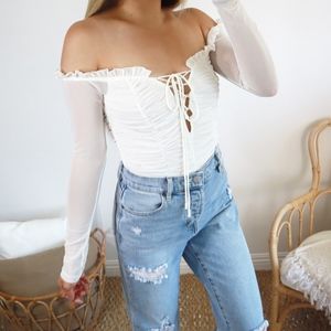 Mesh long sleeve lace up bodysuit